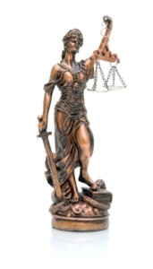 16626441 - statue of justice on a white background closeup with reflection